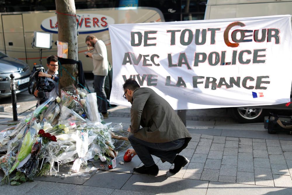 Francia rinde homenaje al policía asesinado en los Campos Elíseos