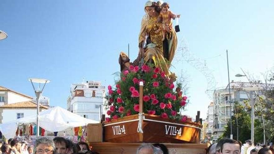 La procesión de la Virgen del Carmen, el año pasado.  // Muñiz