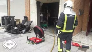 Controlado un fuego en un taller eléctrico en la calle Santa Isabel de Lugones