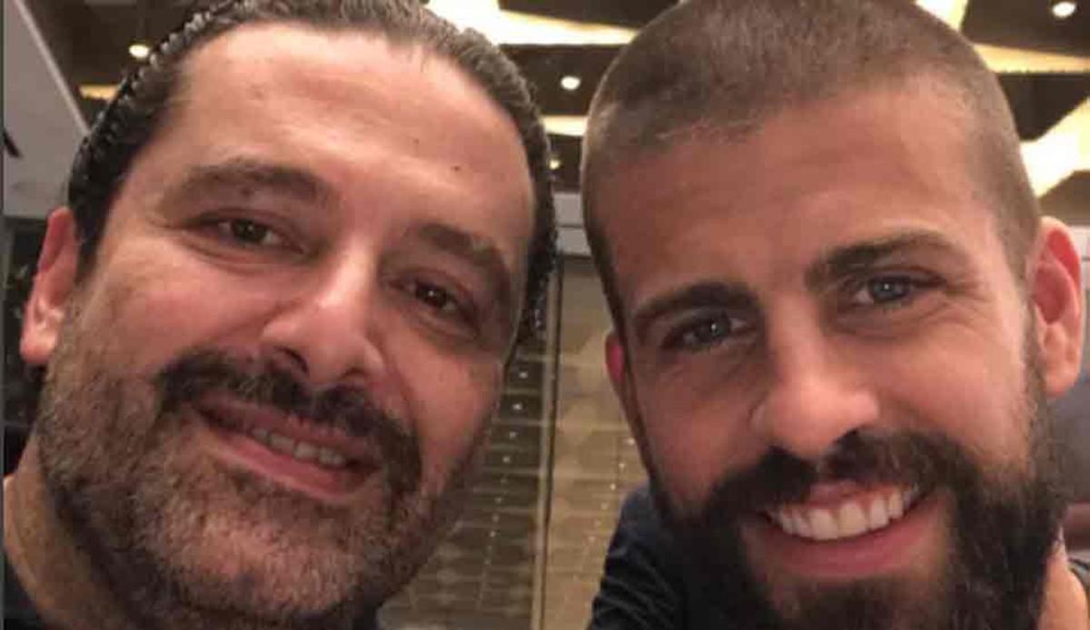 Saad Hairi y Piqué, durante la recepción