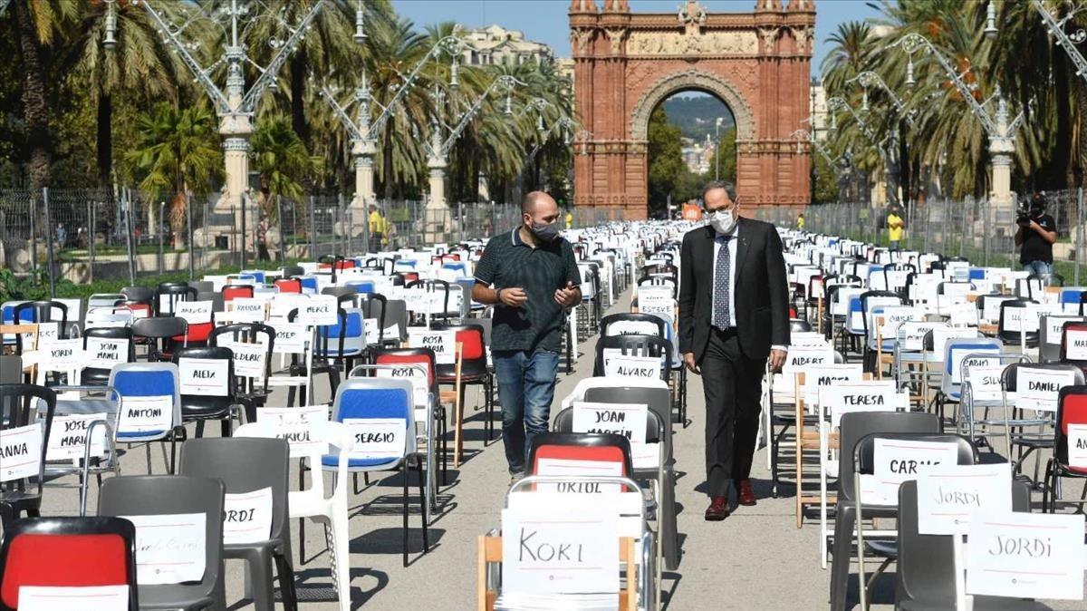 Marcel Mauri y Quim Torra en el acto de Òmnium en el paseo Lluís Companys.