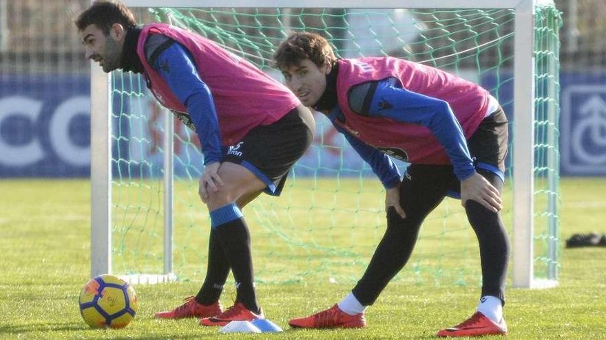 Mosquera y Adrián, ayer en la ciudad deportiva.