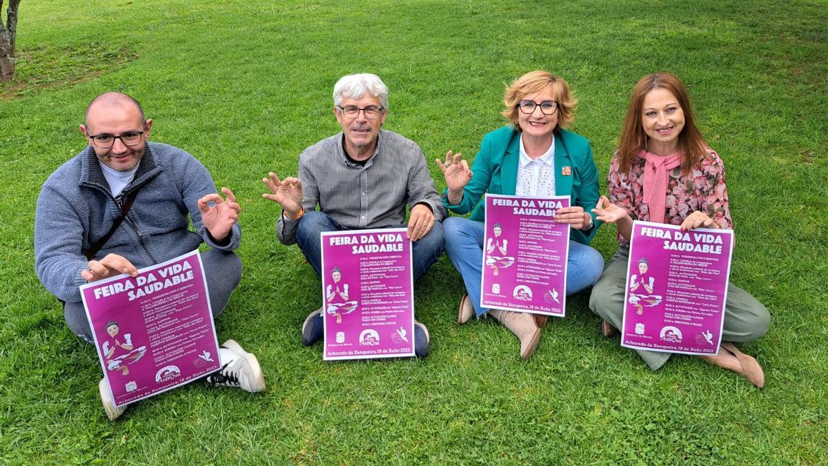 Representantes de la organización y del Concello.