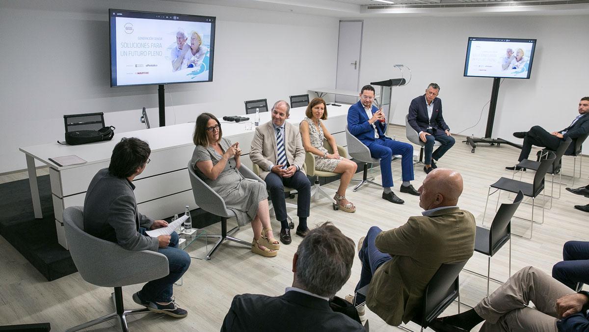 Un instante de la mesa redonda celebrada en el auditorio de la Torre Mapfre.