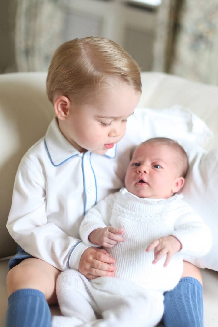 Prince George and Princess Charlotte are seen in this undated handout photo