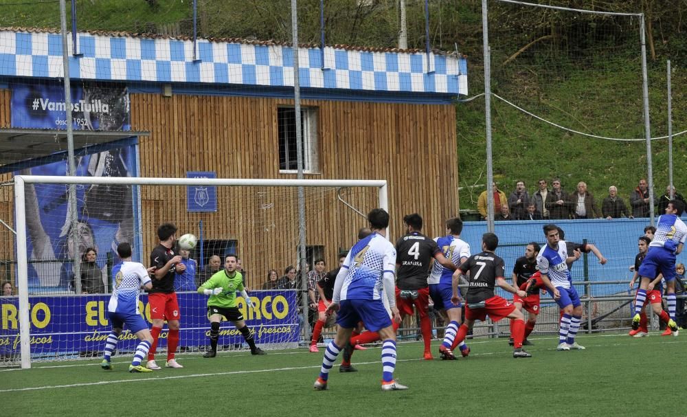 El partido entre el Tuilla y el Langreo, en imágenes