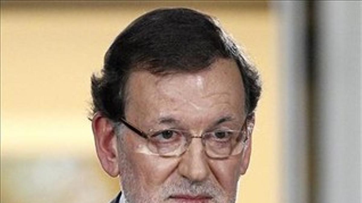 El presidente del Gobierno, Mariano Rajoy, en la rueda de prensa de balance del 2013, este viernes, 27 de diciembre, en el Palacio de la Moncloa. EFE / BALLESTEROS