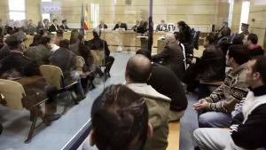 Un grupo de acusados de los atentados del 11M sigue el juicio desde una pecera el 31 de octubre de 2007.