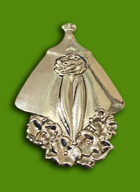 Insignia de plata de los vestidores de Lledó.