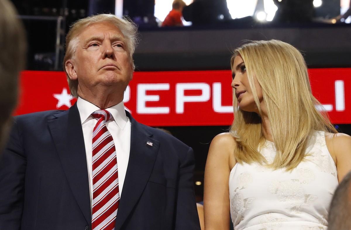 Republican U.S. presidential nominee Donald Trump stands in the Trump family box with his daughter Ivanka (R), awaiting the arrival onstage of his son Eric at the conclusion of former rival candidate Senator Ted Cruz’s address, during the third night at the Republican National Convention in Cleveland, Ohio, U.S. July 20, 2016. REUTERS/Aaron P. Bernstein