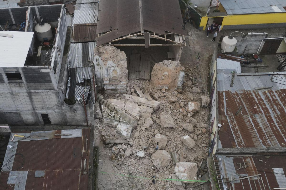 El Calvario Catholic Church lies damaged in Santa Maria de Jesus, Guatemala, Wednesday, July 9, 2025, following dozens of earthquakes and aftershocks. (AP Photo/Moises Castillo). EDITORIAL USE ONLY/ONLY ITALY AND SPAIN