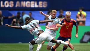 Belgiums forward #11 Jeremy Doku, midfielder #07 Kevin De Bruyne, and Spains forward #10 Dani Olmo fight for the ball during the 2026 World Cup football tournament quarter-final match between Spain and Belgium at the Los Angeles Stadium in Inglewood on July 10, 2026. (Photo by Patrick T. Fallon / AFP)