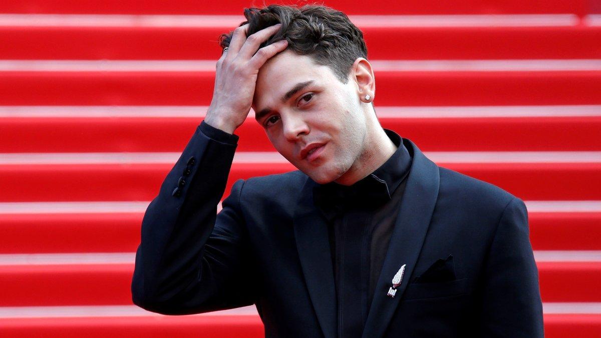 72nd??Cannes??Film Festival - After the screening of the film Matthias & Maxime (Matthias et Maxime) in competition - Red Carpet?? -??Cannes, France, May 22, 2019. Director Xavier Dolan reacts. REUTERS/Jean-Paul Pelissier