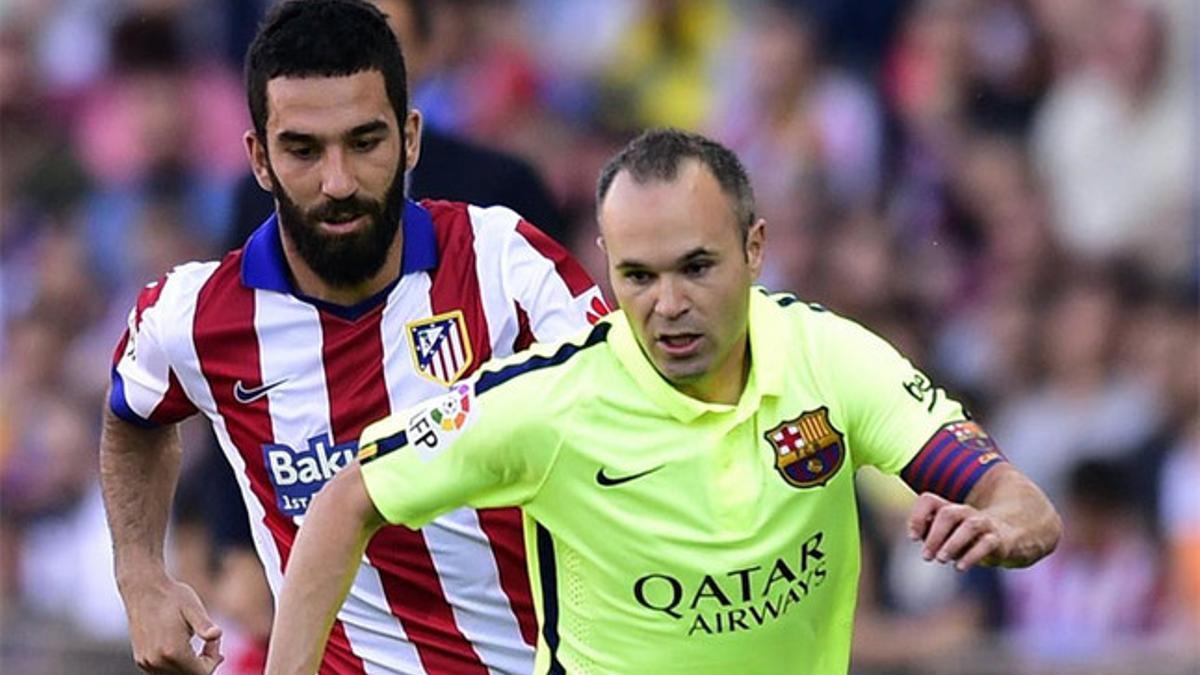 Iniesta con Arda Turan, esta pasada temporada