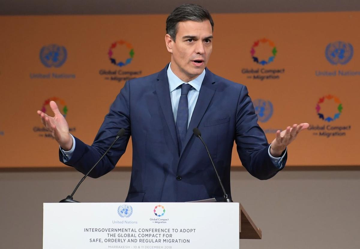 Spanish Prime Minister Pedro Sanchez addresses the United Nations conference on migration on December 10  2018 in the Moroccan city of Marrakesh  - Politicians from around the globe gathered in Morocco for a major conference to endorse a United Nations migration pact  despite a string of withdrawals driven by anti-immigrant populism  The Global Compact for Safe  Orderly and Regular Migration was finalised at the UN in July after 18 months of talks and is due to be formally adopted with the bang of a gavel at the start of the two-day conference in Marrakesh   Photo by FETHI BELAID   AFP