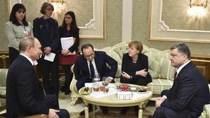 Vladimir Putin, Petró Poroshenko, Angela Merkel y François Hollande, en la cumbre de Minsk.