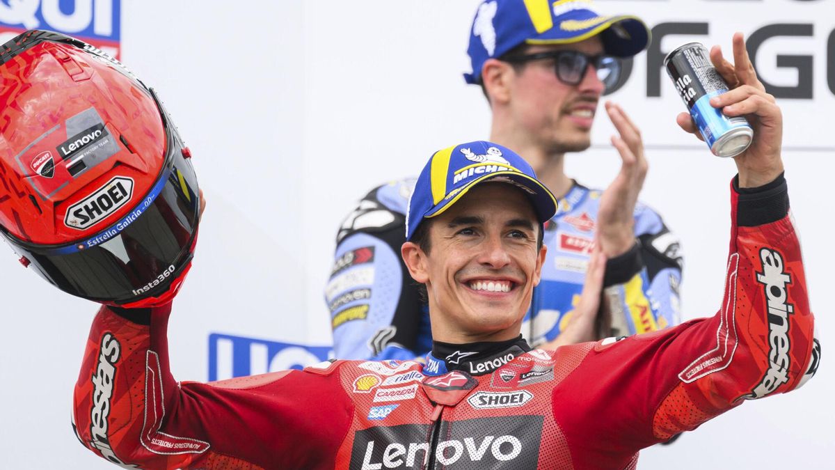 Winner Marc Marquez, front, from Spain from the Ducati Lenovo Team celebrates on the podium ahead of second-placed Alex Marquez from Spain from the Gresini Racing MotoGP Team following the MotoGP race, German Grand Prix, at the Sachsenring circuit, in Hohenstein-Ernstthal, Germany, Sunday July 13, 2025. (Robert Michael/dpa via AP). GERMANY OUT; MANDATORY CREDIT