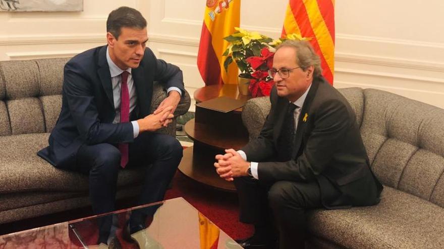 Sánchez y Torra, durante su reunión.