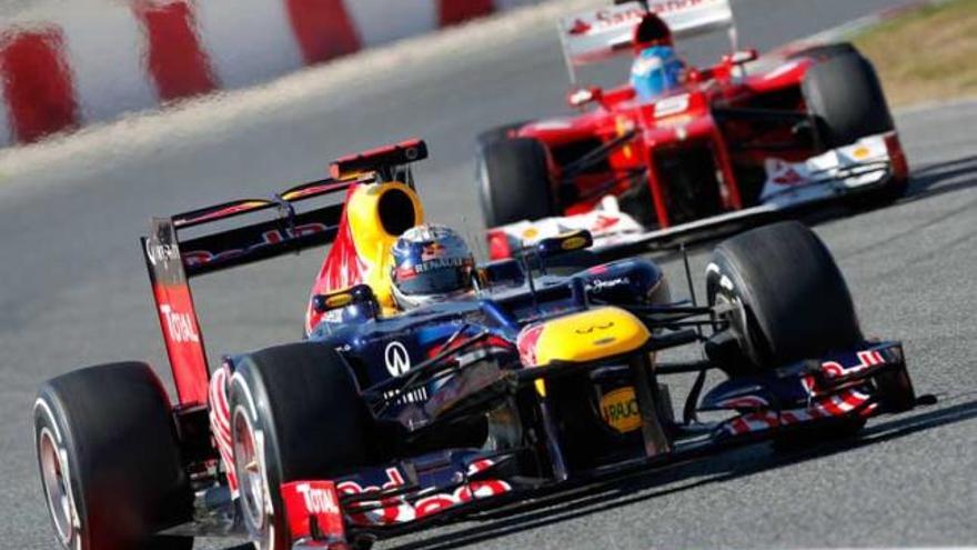 Sebastian Vettel, por delante de Fernando Alonso.