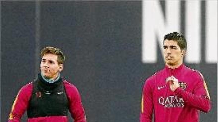 Messi i Luis Suárez en l&#039;entrenament d&#039;ahir a la tarda a Barcelona.