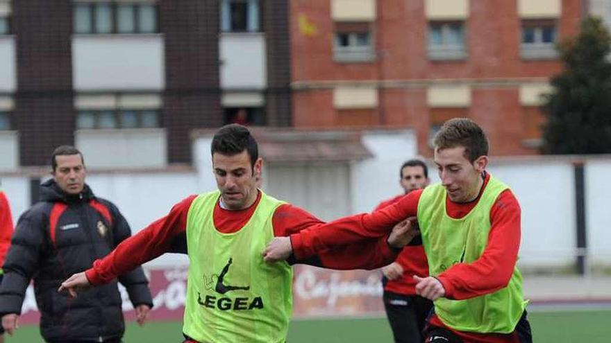 Abraham y Robert en un entrenamiento con el Caudal en la 2013-2014.