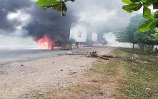 Manifestantes en Honduras prenden fuego a decenas de contenedores