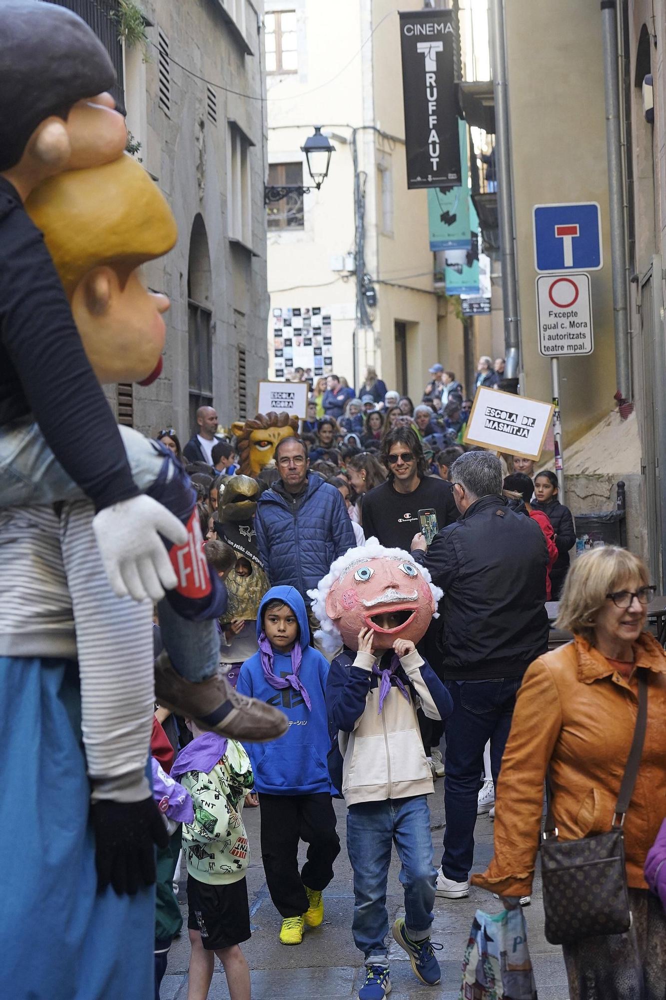 Les fotos de la cercavila d'escoles amb la Girona Marxing Band i els Gegantons de Girona