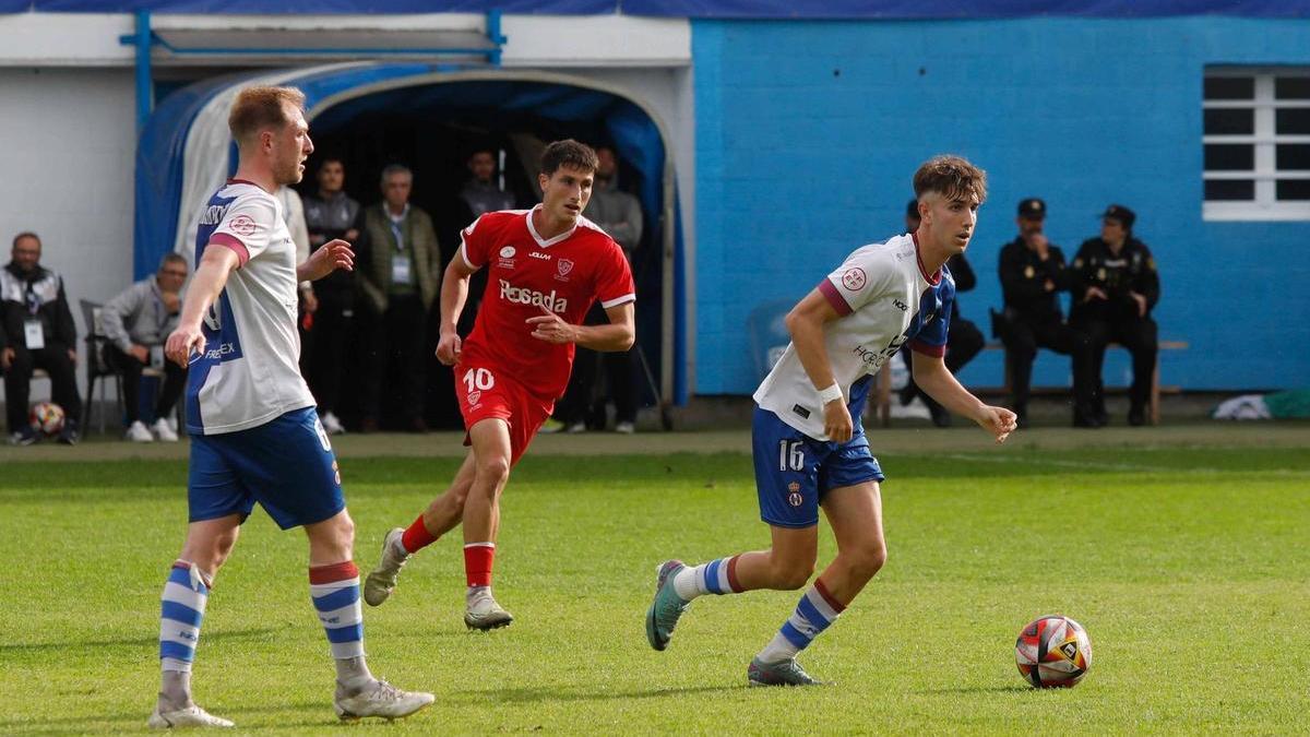 Miguel Sierra y Edu Cortina, durante un partido contra el Marino
