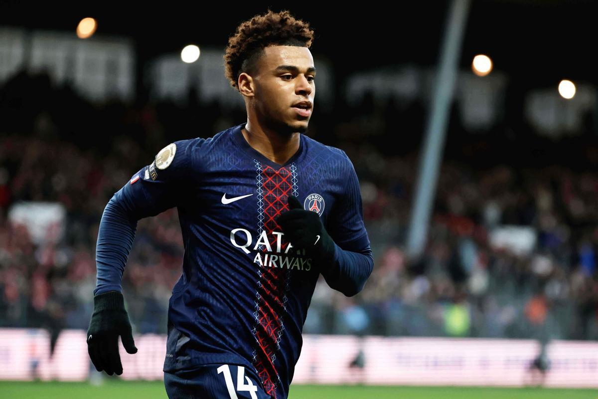 PSG's Desire Doue reacts after scoring his side's third goal during the French League One soccer match between Brest and Paris Saint Germain in Brest, France, Saturday, Oct. 25, 2025. (AP Photo/Jeremias Gonzalez)