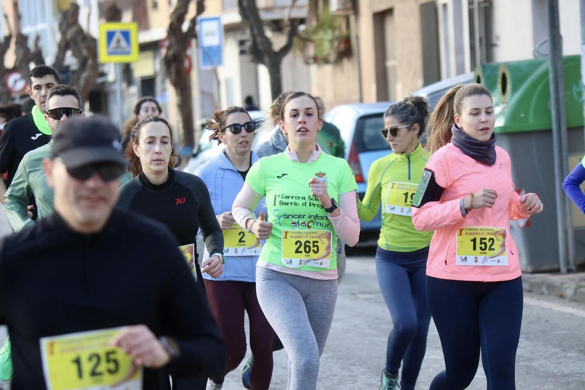 Las imágenes de la carrera popular solidaria en el barrio de El Progreso
