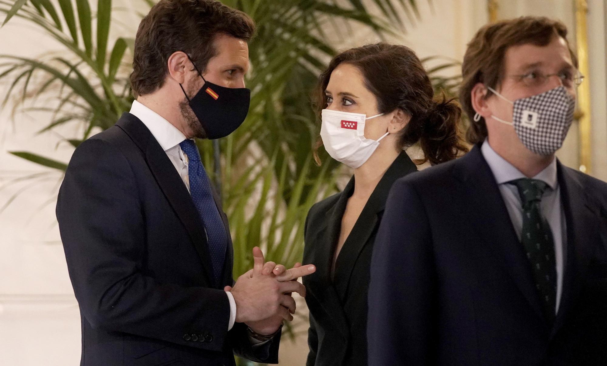 Pablo Casado, Isabel Díaz Ayuso y José Luis Martínez Almeida en la presentación del libro de Mariano Rajoy.