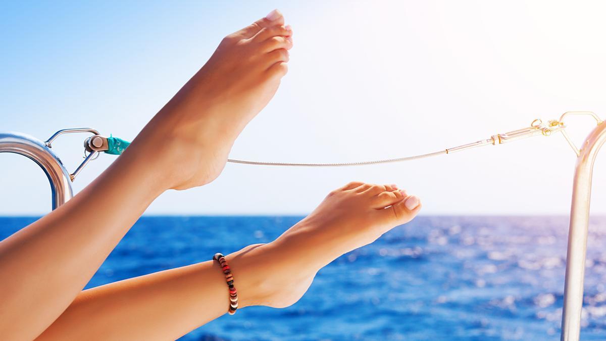 20785710 - closeup on beautiful sexy women’s feet on the yacht, carefree vacation, journey on sailboat, happy and healthy lifestyle, pleasure concept 20785710 - closeup on beautiful sexy women’s feet on the yacht, carefree vacation, journey on sailboat, happy and healthy lifestyle, pleasure concept