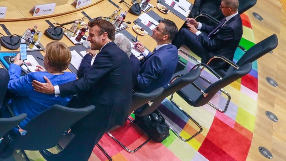 Emmanuel Marcon y Angela Merkel durante la cumbre.