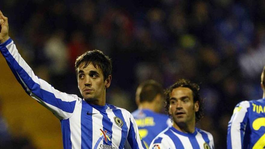 Carlos Calvo celebra un gol con el Hércules junto a Paco Peña