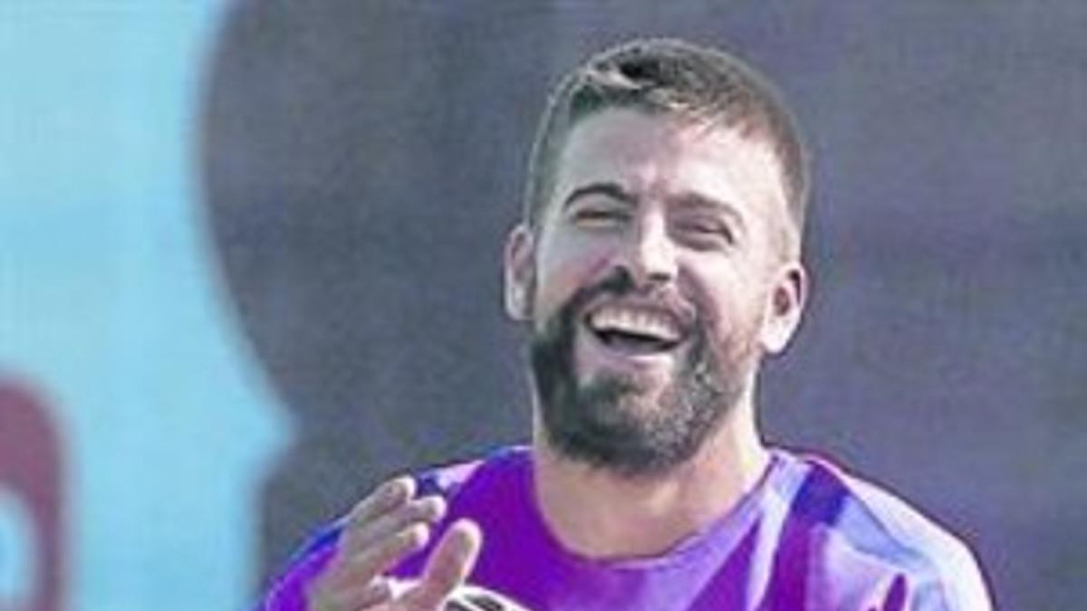 Piqué, ayer en el entrenamiento del Barça en la ciudad deportiva.