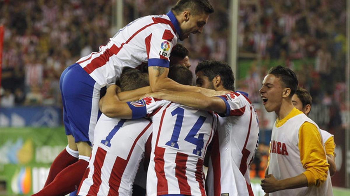 Los jugadores del Atlético, celebrando el gol de Mandzukic