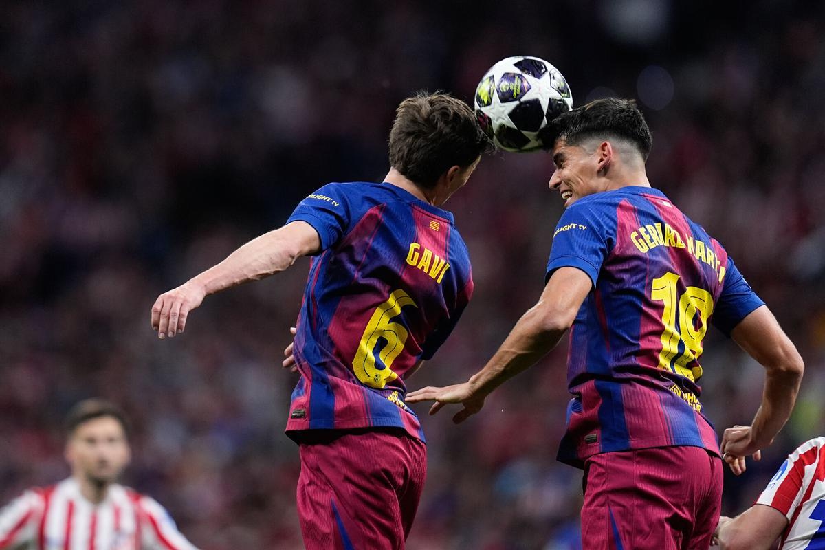 Pablo Martin Gavira Gavi and Gerard Martin of FC Barcelona in action during the UEFA Champions League 2025/26 Quarter-Final Second Leg match between Atletico de Madrid and FC Barcelona at Riyadh Air Metropolitano on April 14, 2026, in Madrid, Spain. AFP7 14/04/2026 ONLY FOR USE IN SPAIN