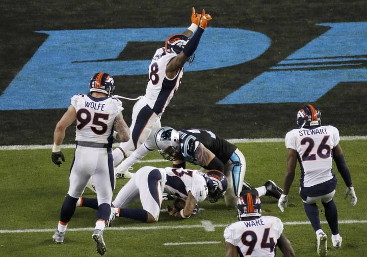 Denver Broncos' Ward recovers a fumble by Carolina Panthers' quarterback Newton during the fourth quarter of the NFL's Super Bowl 50 football game in Santa Clara