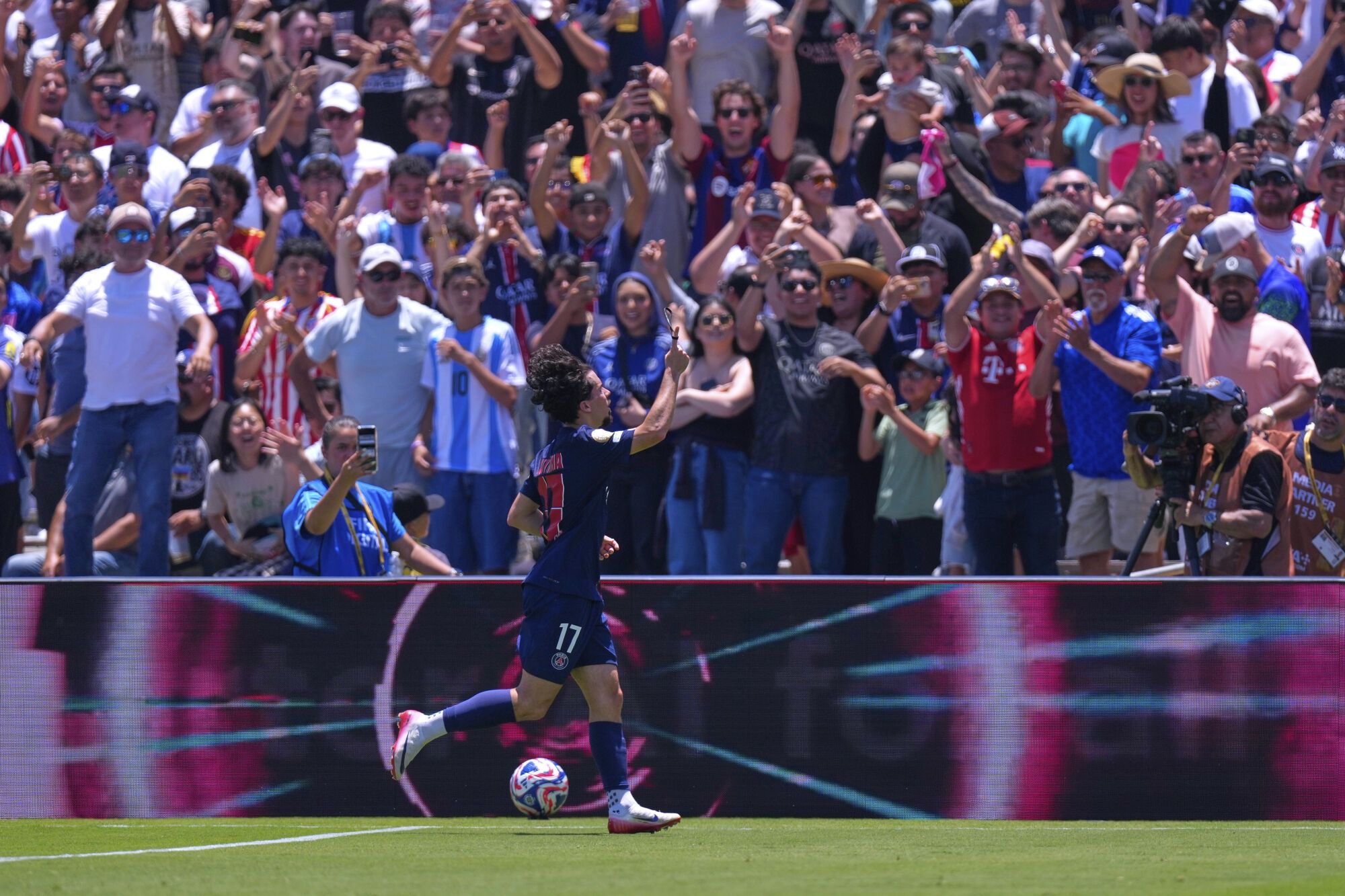 Paris Saint-Germain's Vitinha celebrates after scoring his side's second goal during the Club World Cup group B soccer match between PSG and Atletico Madrid, in Pasadena, Calif., Sunday, June 15, 2025. (AP Photo/Mark J. Terrill)