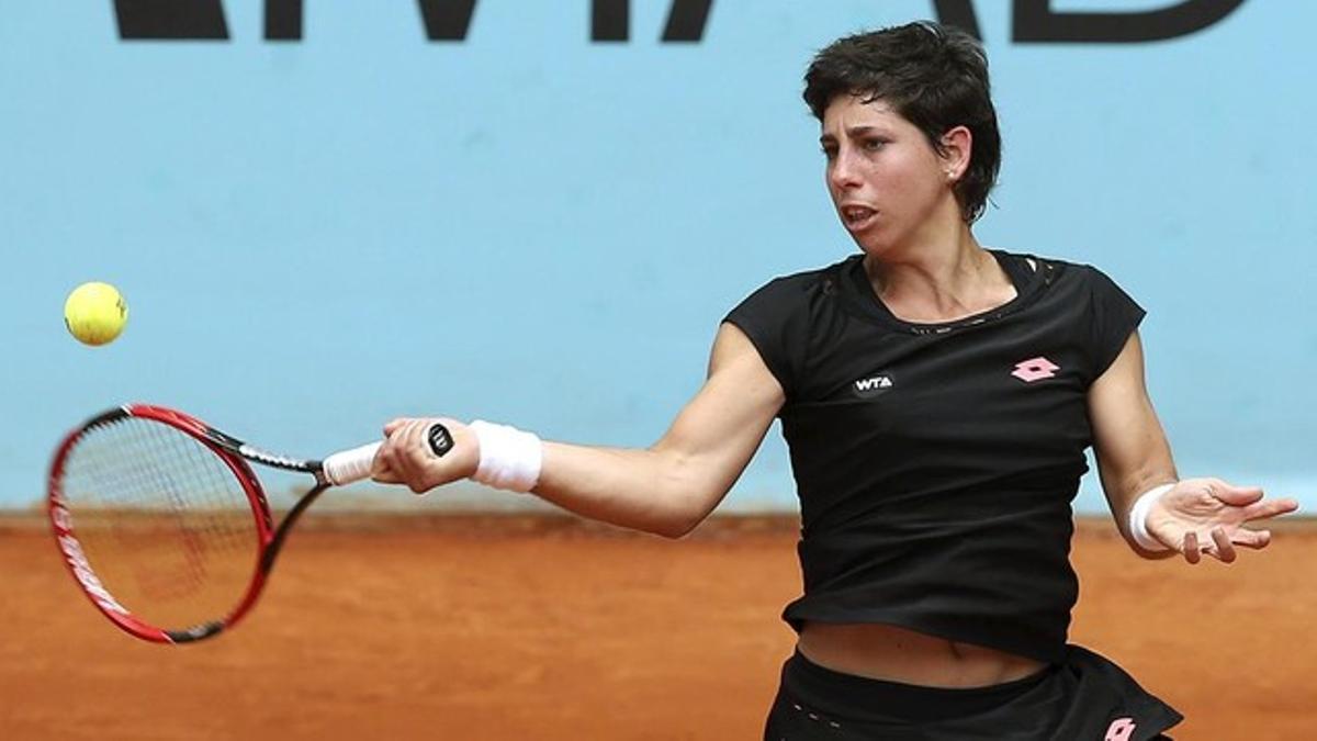 La tenista española Carla Suárez en la primera ronda de torneo Mutua Madrid Open