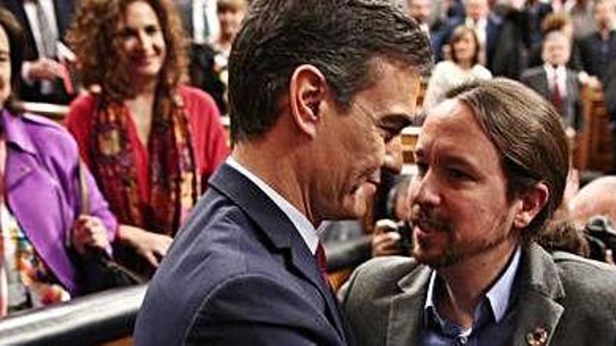 Pedro Sánchez i Pablo Iglesias celebren l&#039;obtenció del govern