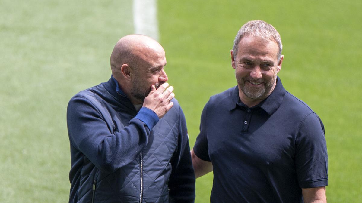Manolo González y Hansi Flick, este miércoles en el RCDE Stadium.