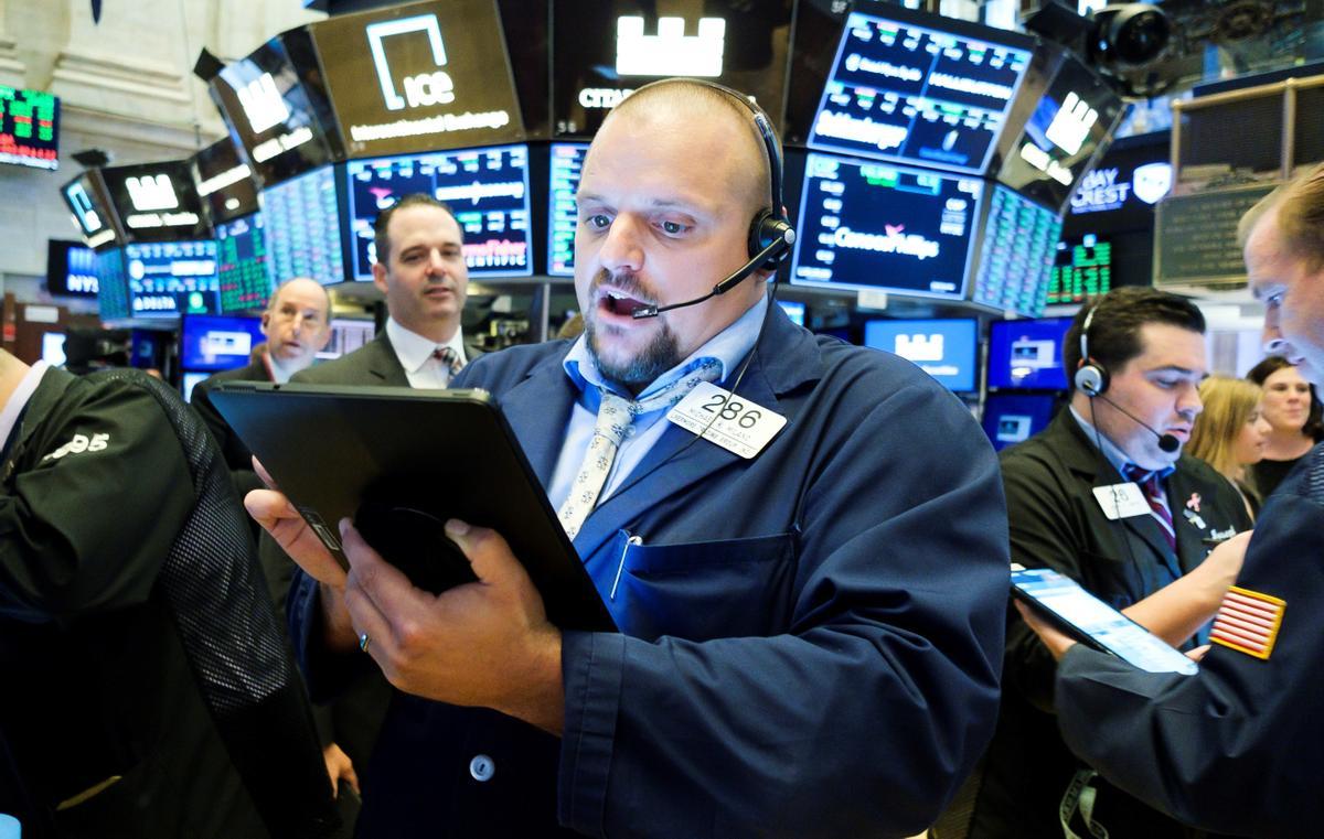 Agentes trabajando en la bolsa de Nueva York. JUSTIN LANE