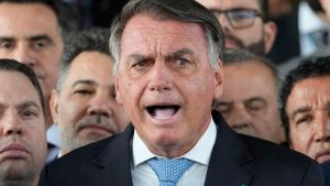 El expresidente de Brasil Jair Bolsonaro, durante una comparecencia ante los medios tras conocer su imputación, este miércoles en Brasilia.