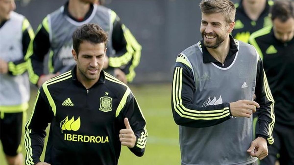 Piqué y Cesc, en un entrenamiento de España durante el Mundial de Brasil