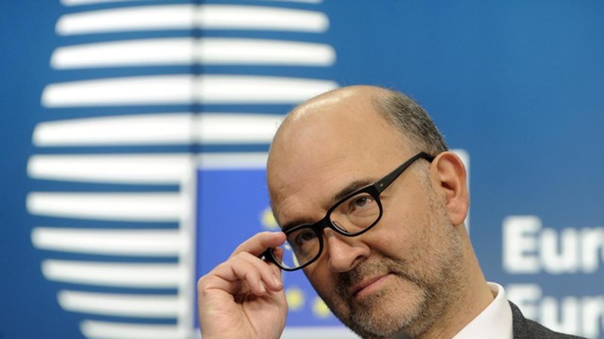 European Commissioner for economics, taxation and customs Pierre Moscovici attends a press conference after an Euro zone finance ministers meeting in Brussels