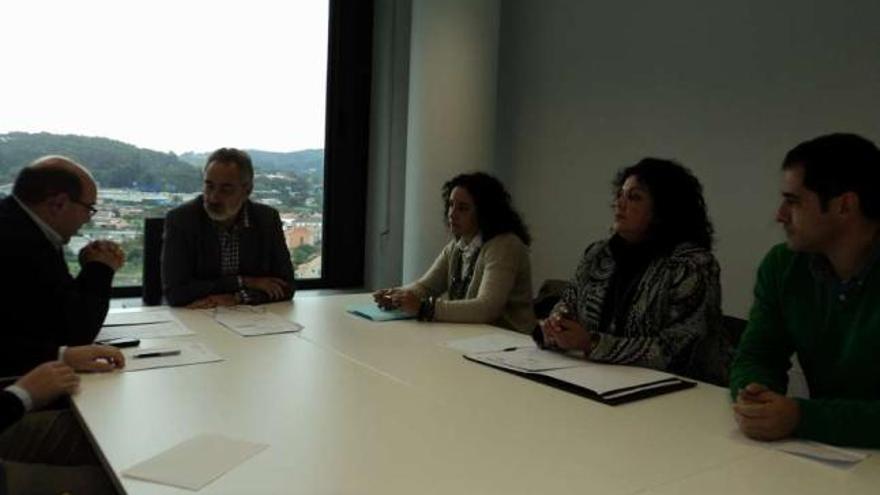 Pérez Ares, Cores Tourís, Peña, Peón y Espiño, ayer, durante la reunión en Pontevedra.