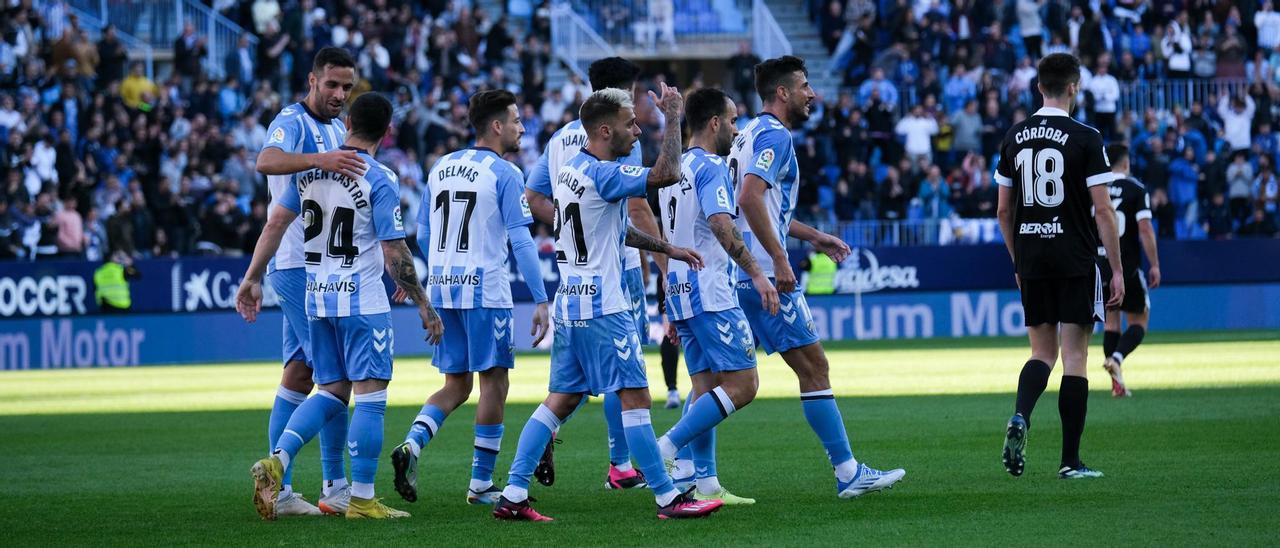 El Málaga CF celebra el gol contra el Burgos.