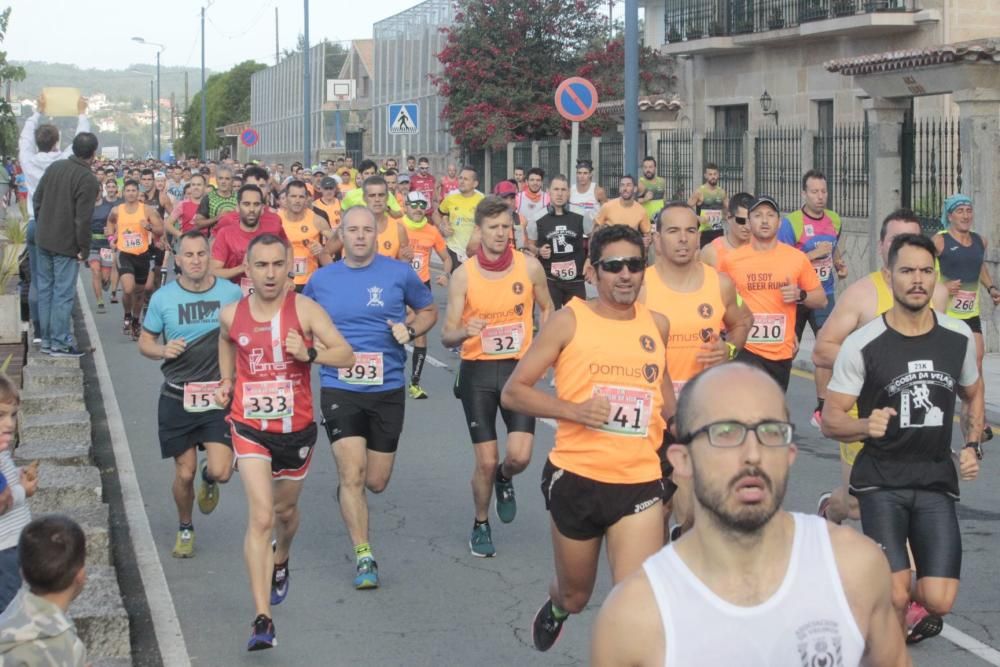 Prieto y Figueroa se cuelgan el oro en la 21K Costa da Vela. // Santos Álvarez