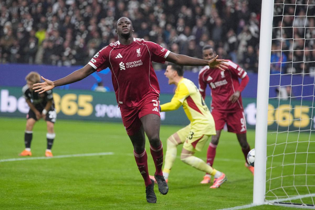 Liverpool's Ibrahima Konate celebrates after scoring his side's third goal during the Champions League opening phase soccer match between Eintracht Frankfurt and Liverpool in Frankfurt, Germany, Wednesday, Oct. 22, 2025. (AP Photo/Michael Probst)